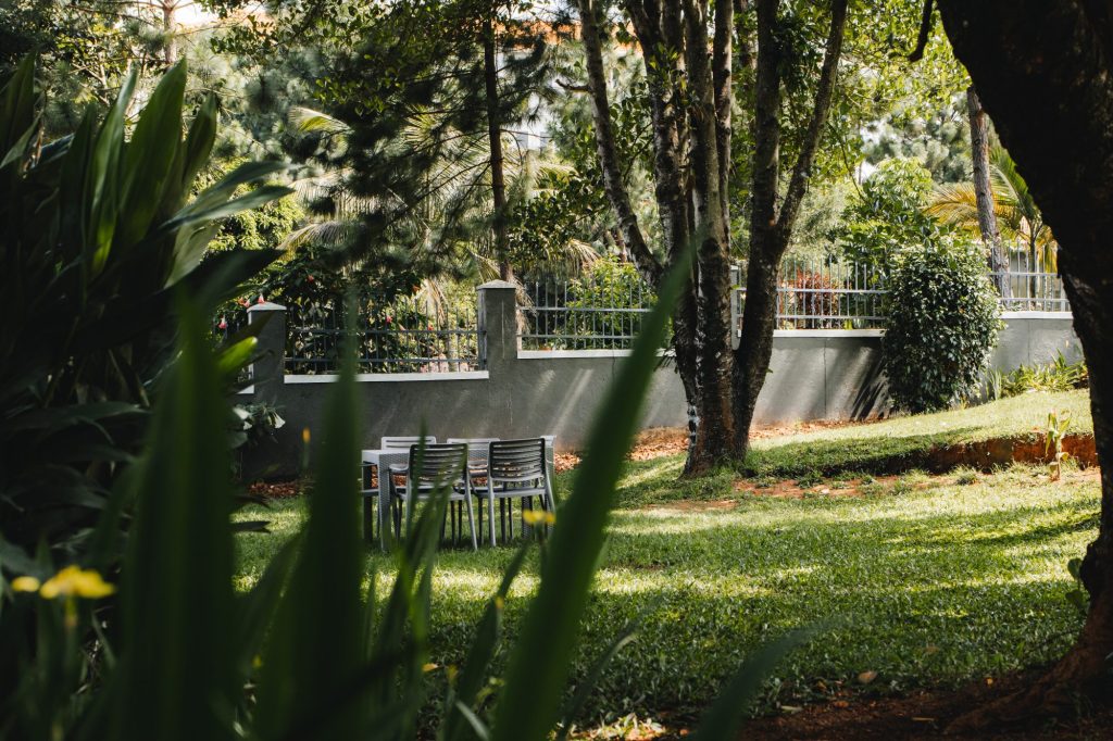 Lush garden with outdoor furniture, JOSIRE Residence