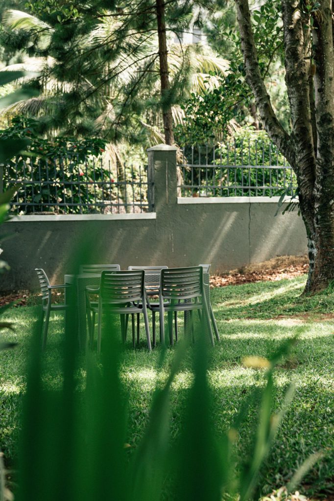 Green garden corridor and foliage, JOSIRE Residence