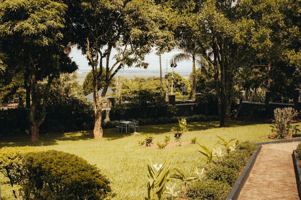 Expansive grounds with lawn and trees, JOSIRE Residence