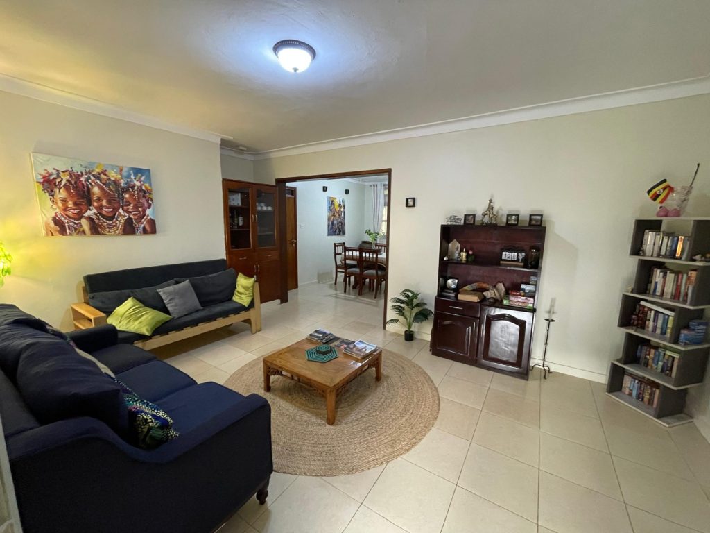 Bright common lounge with seating and reading nook, JOSIRE Residence